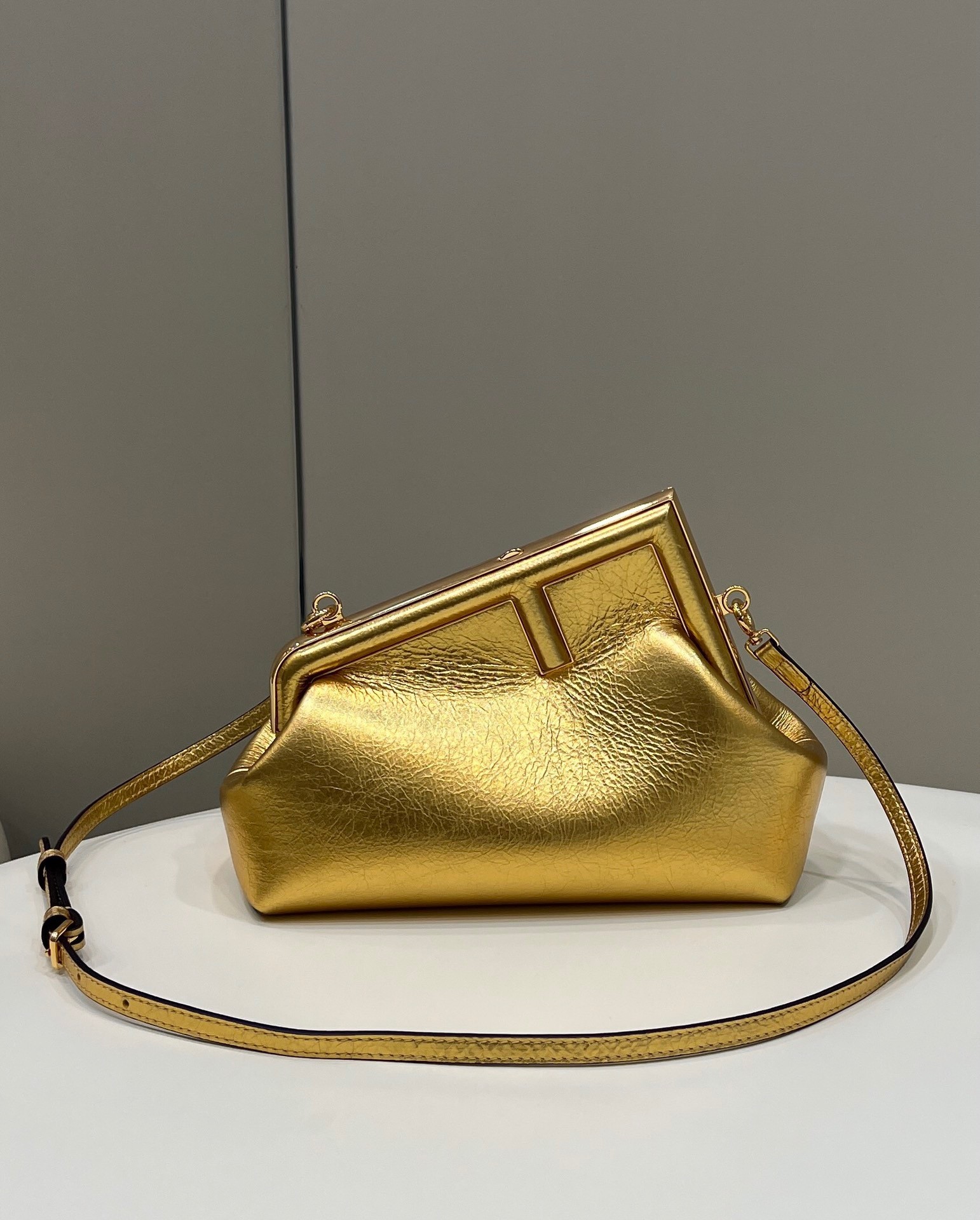 Fendi First Small Bag In Gold Laminated Leather 752