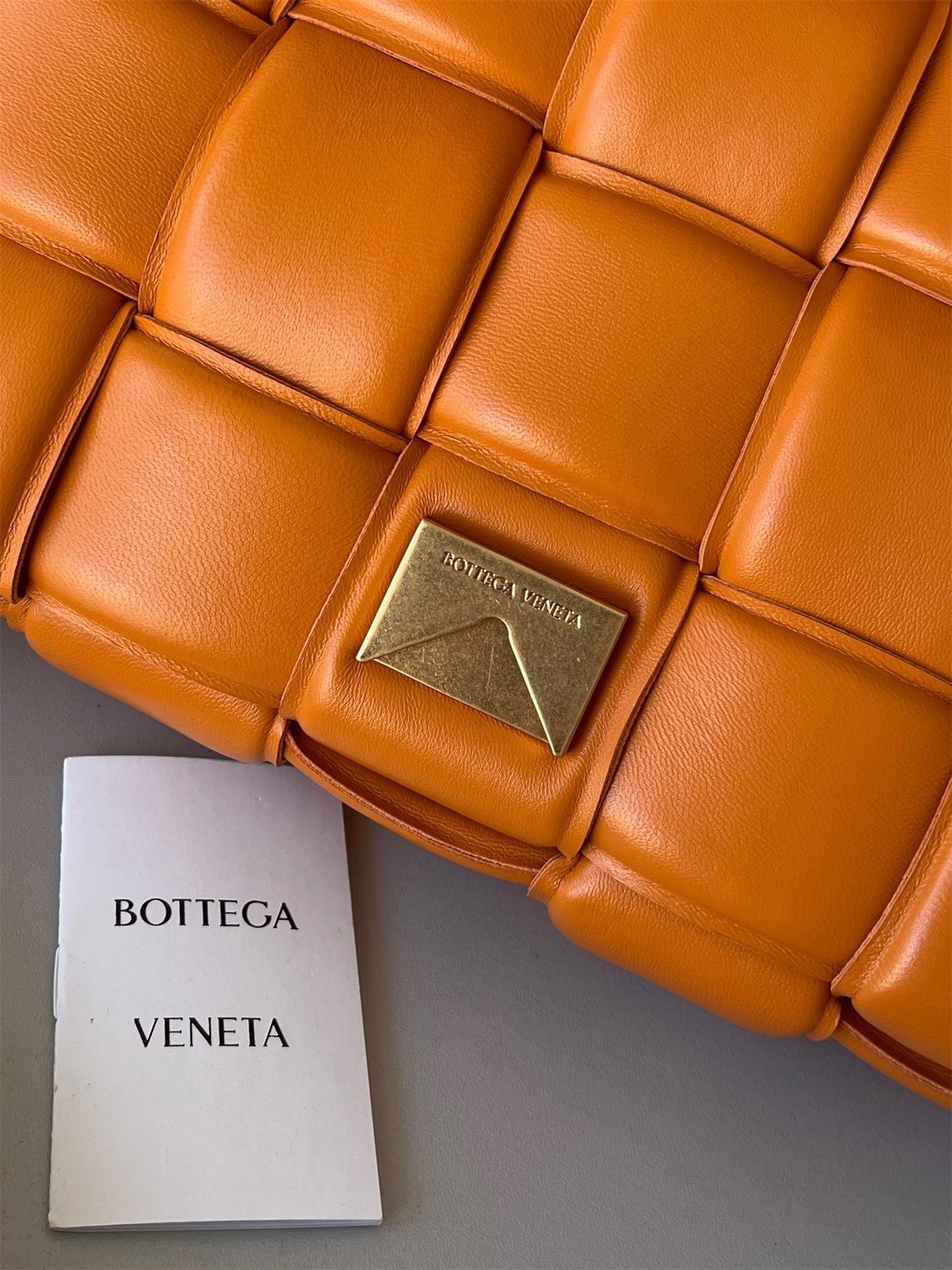 Bottega Veneta Padded Cassette Bag In Orange Lambskin 621