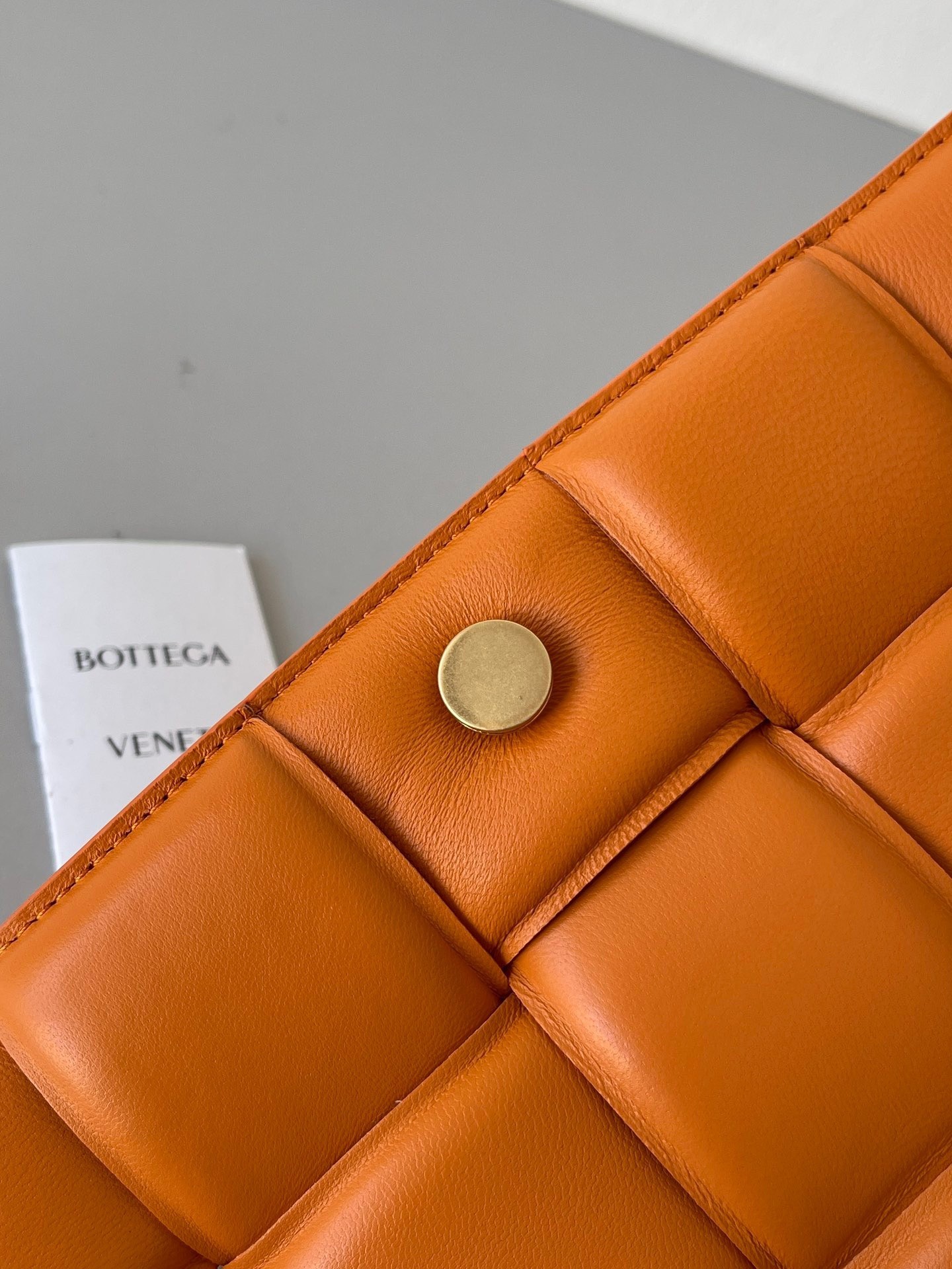 Bottega Veneta Padded Cassette Bag In Orange Lambskin 621