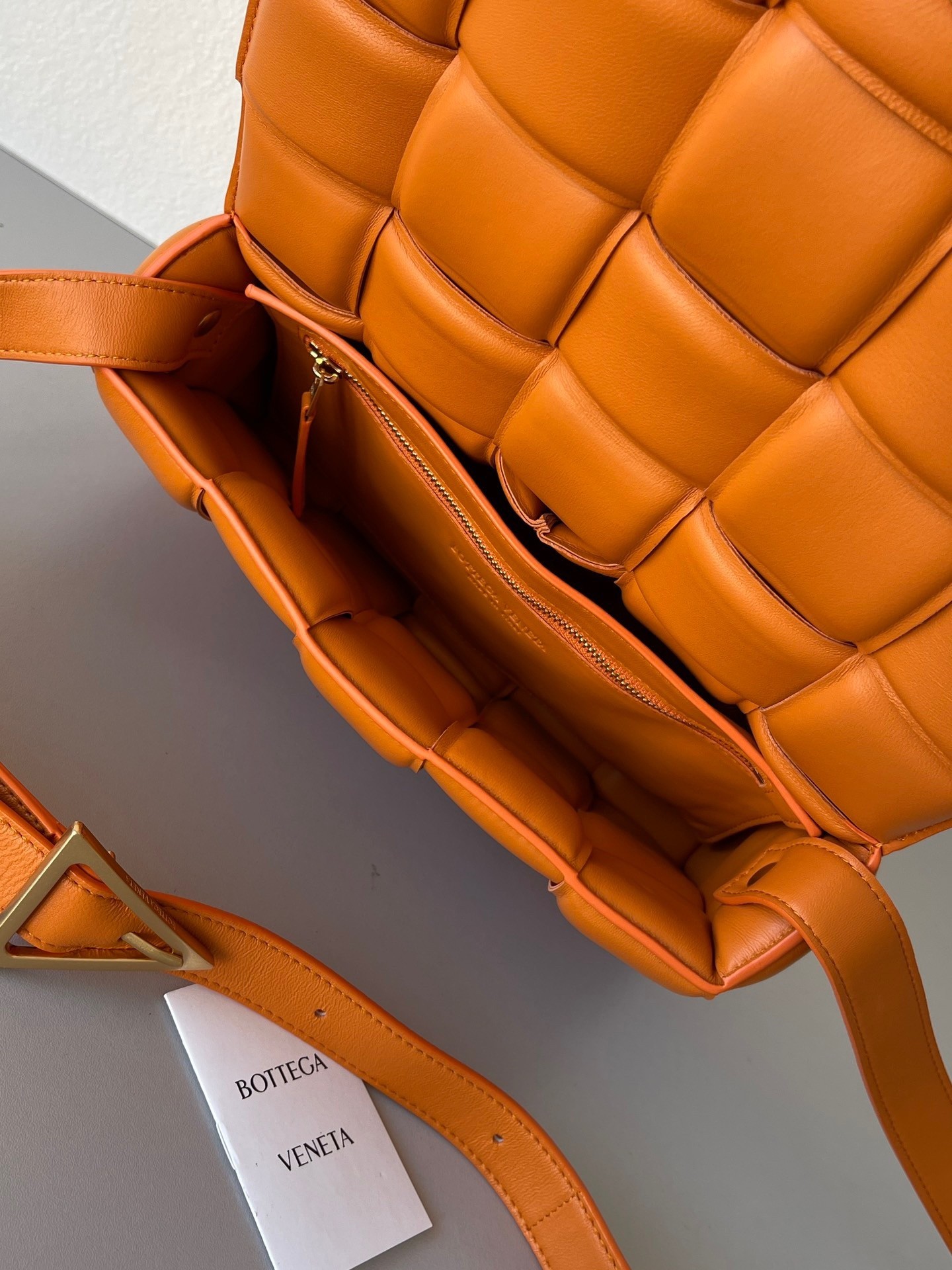 Bottega Veneta Padded Cassette Bag In Orange Lambskin 621