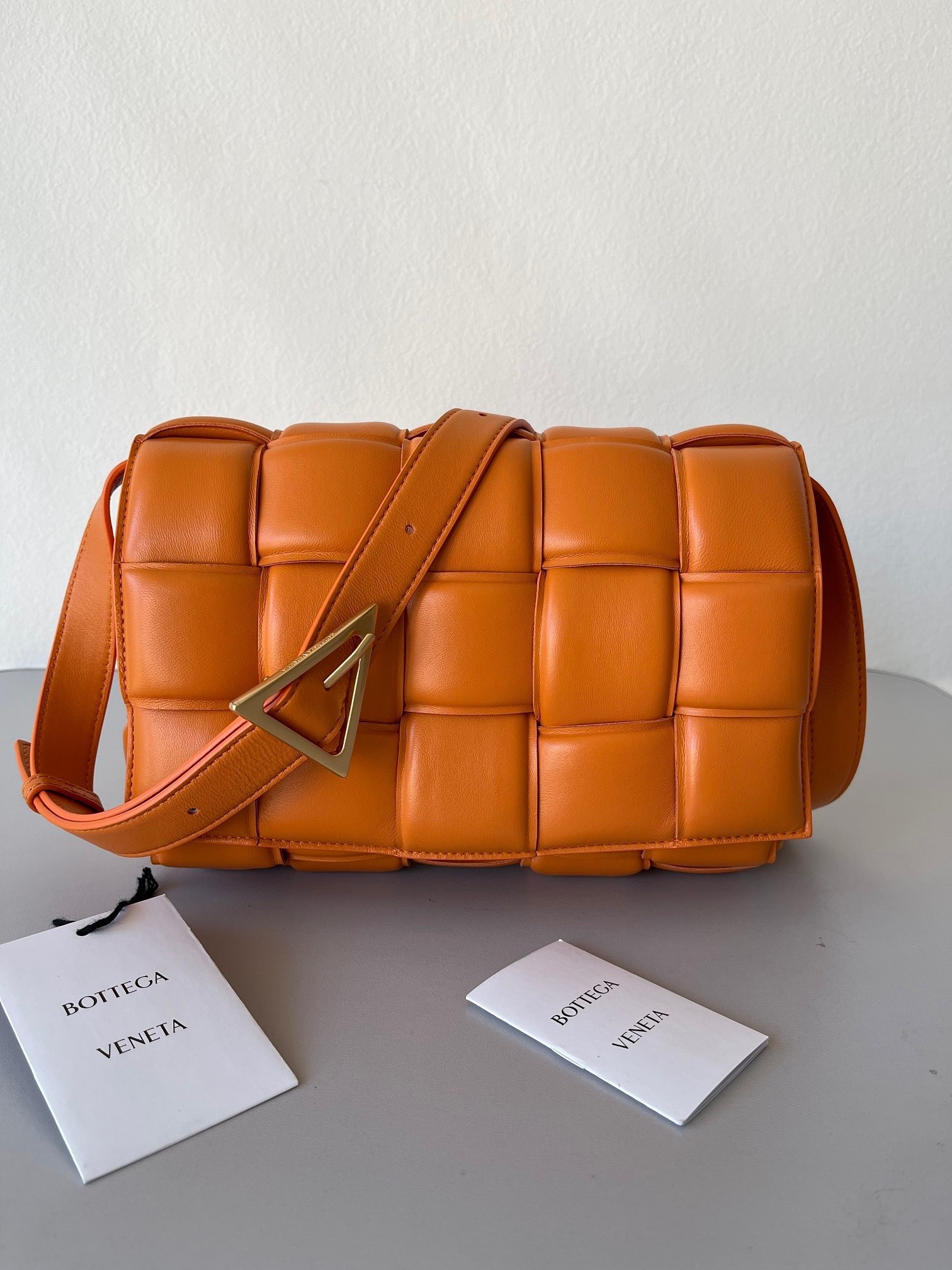 Bottega Veneta Padded Cassette Bag In Orange Lambskin 621