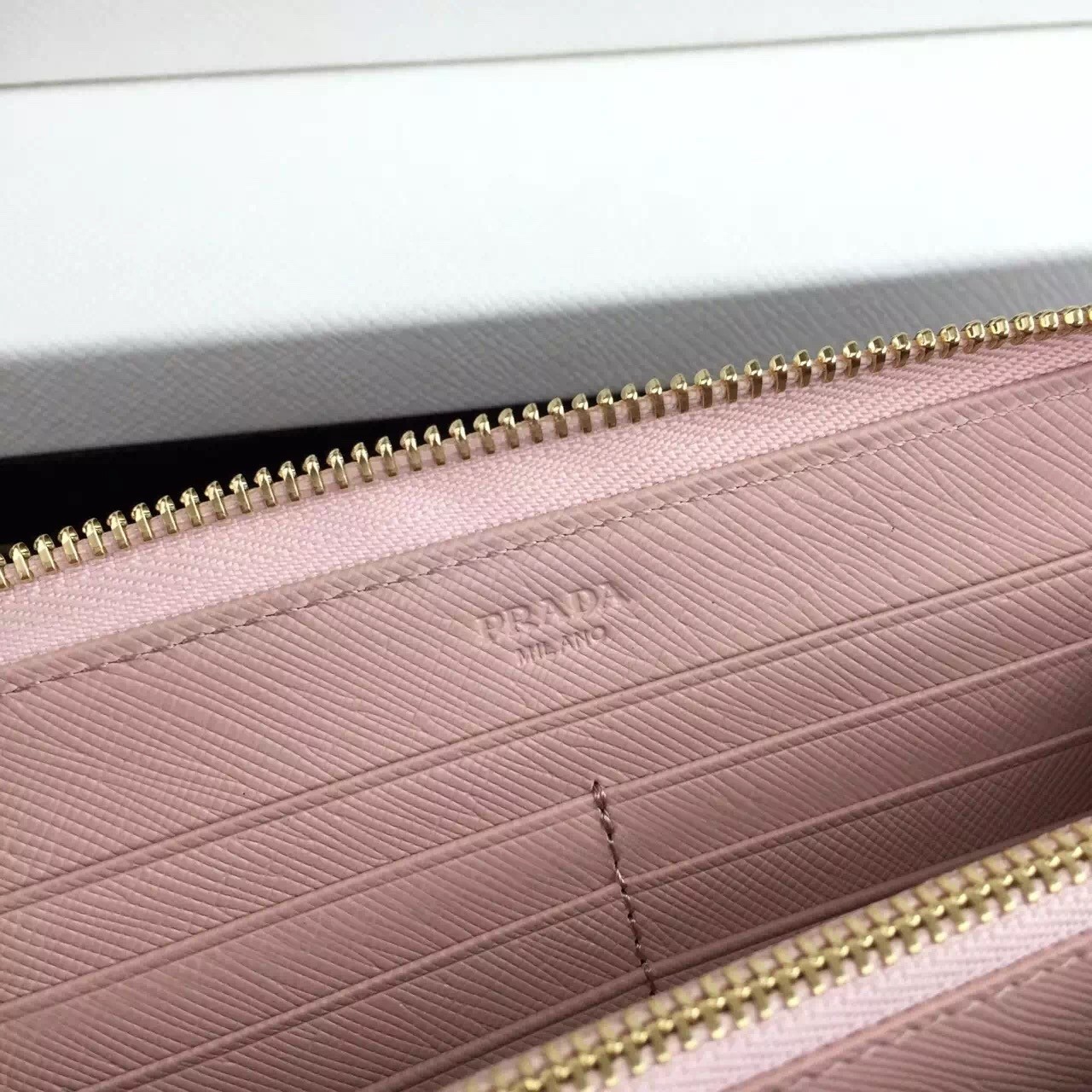 Prada Zipped Wallet In Light Pink Saffiano Leather 997