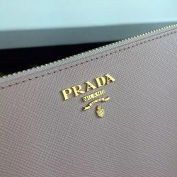 Prada Zipped Wallet In Light Pink Saffiano Leather 997