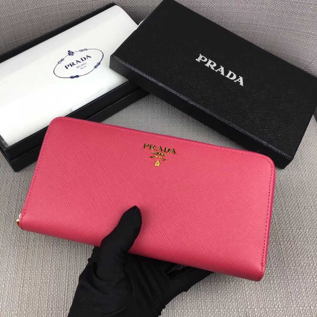 Prada Zipped Wallet In Pink Saffiano Leather 560