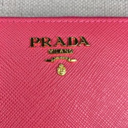 Prada Zipped Wallet In Pink Saffiano Leather 560