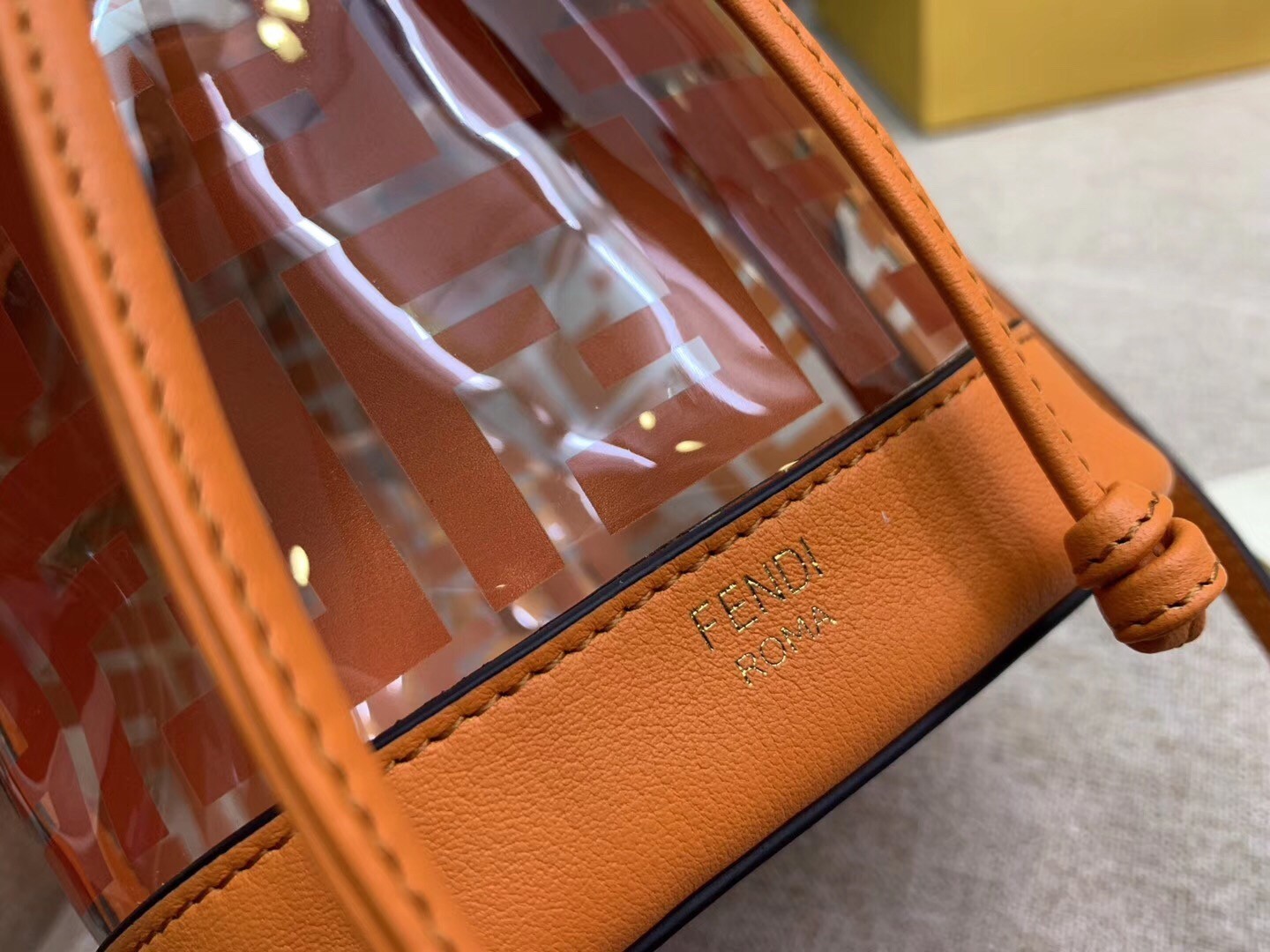 Fendi Orange Mon Tresor Mini Bucket Bag In Transparent PU 605